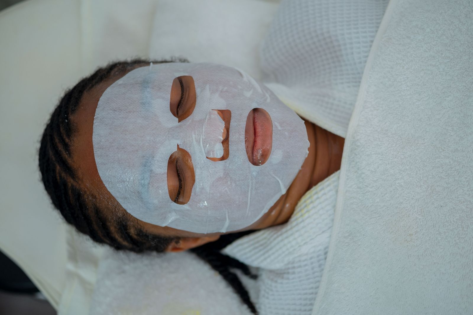Facial mask treatment photographed in Nigeria